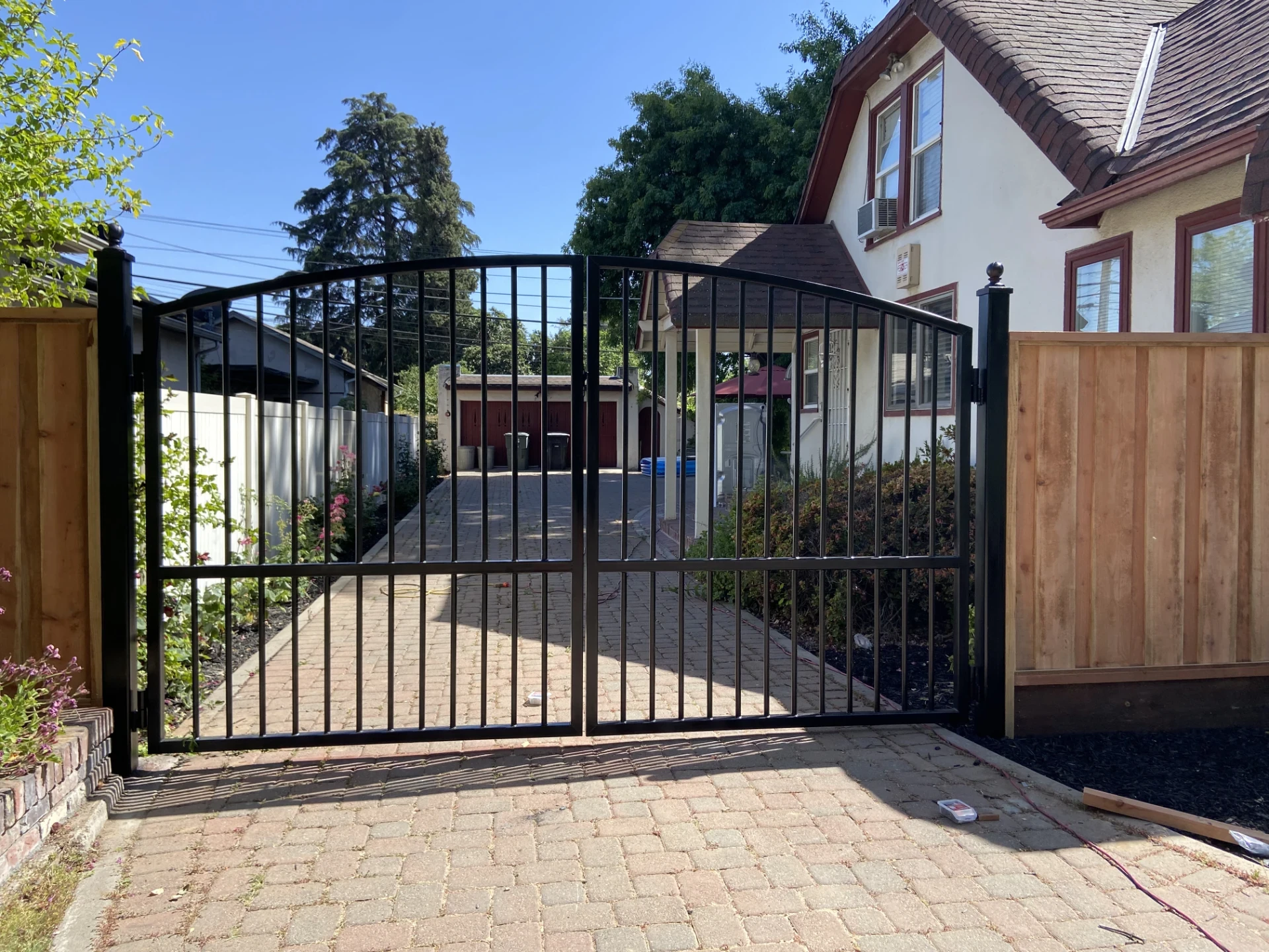 Black stock gate type steel beside on the house