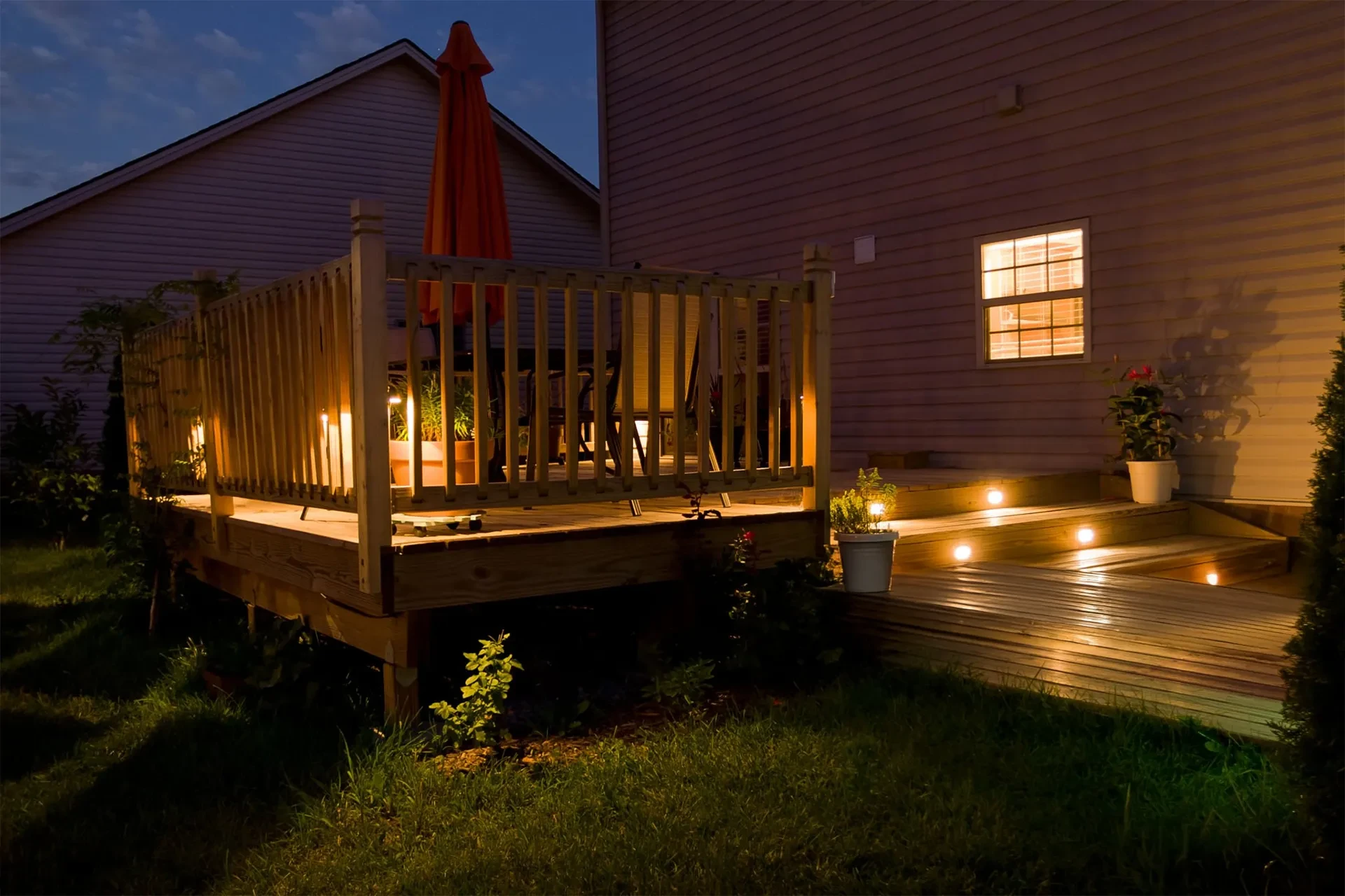 Night scene beautiful patio light decking in a wooden deck