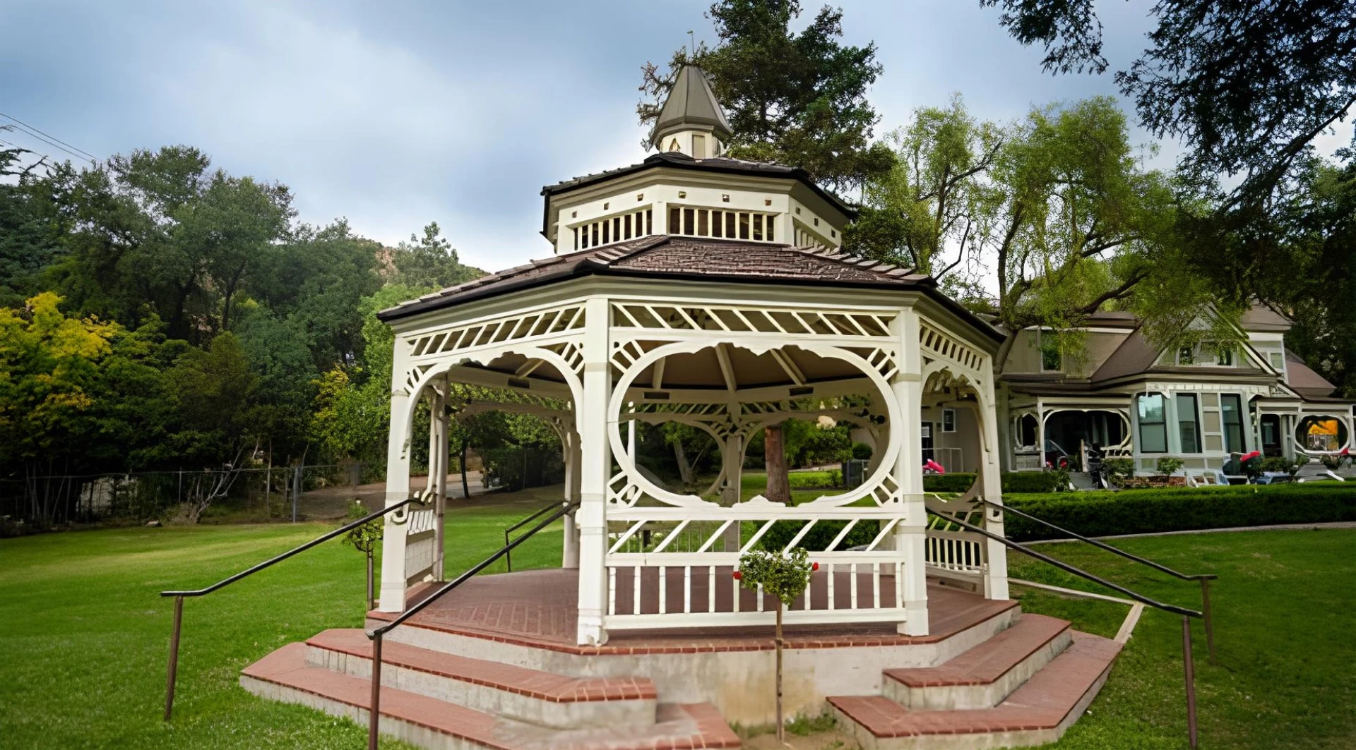 Overlooking view of a victorian gazebo in front of famous doctor house